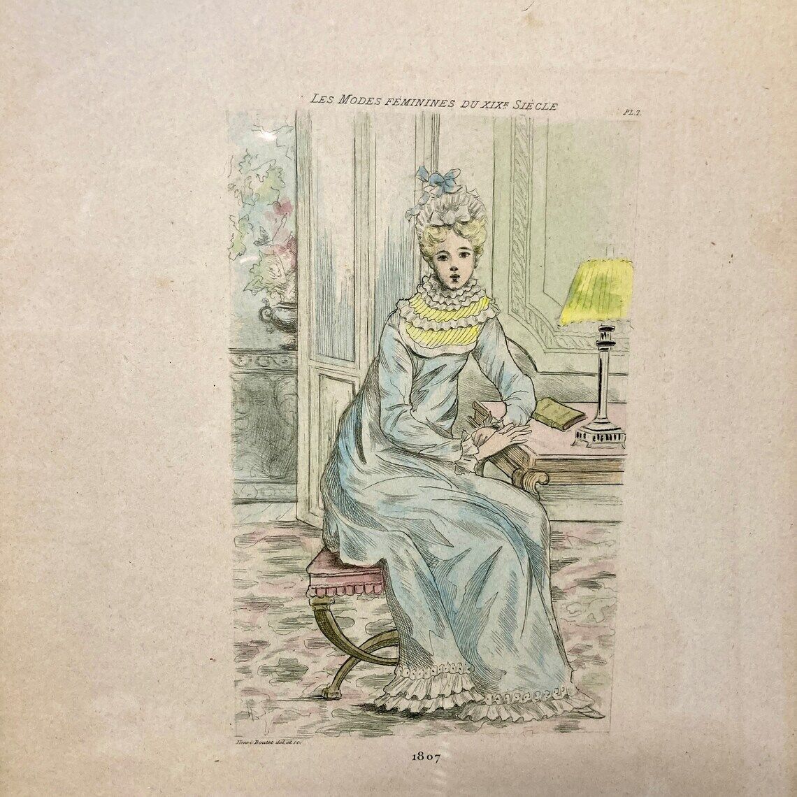 Set of two framed mode engravings