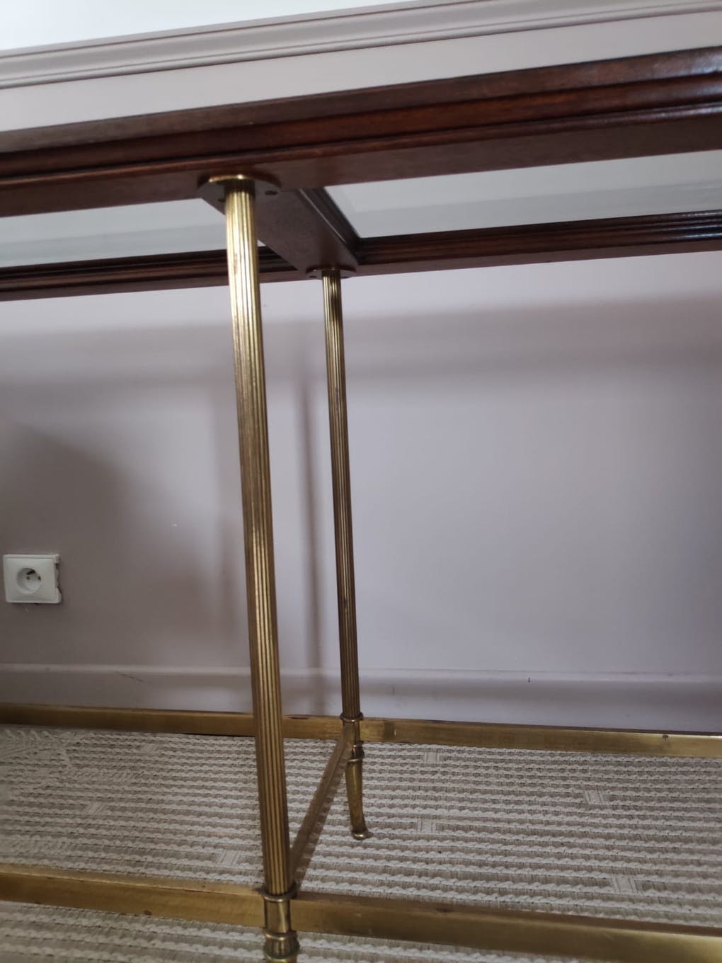 Glass and brass console table