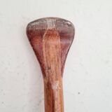 Old single wooden paddle