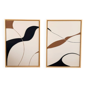 Beige, black, brown diptych design panels.