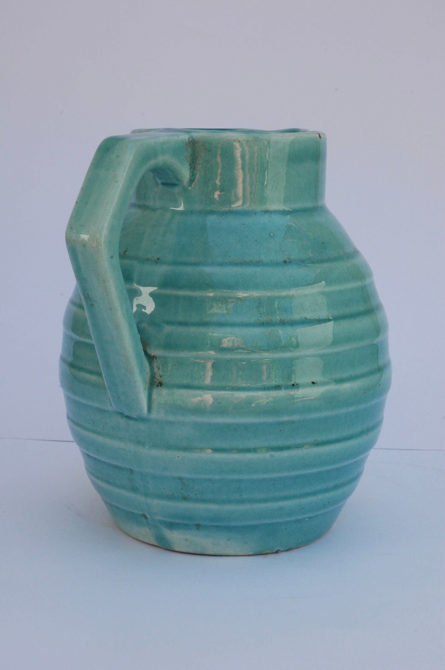 Blue-green pitcher in Orchies earthenware