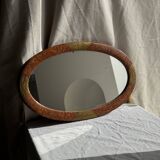 Small oval Art Deco mirror in brown and gold 33x54.