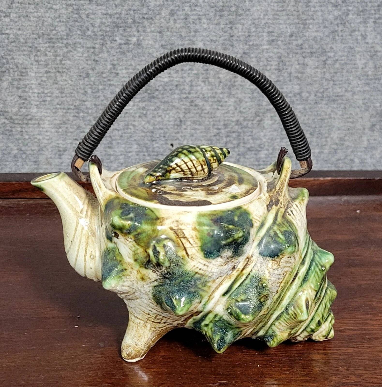 Vintage Japanese ceramic shell-shaped selfish teapot