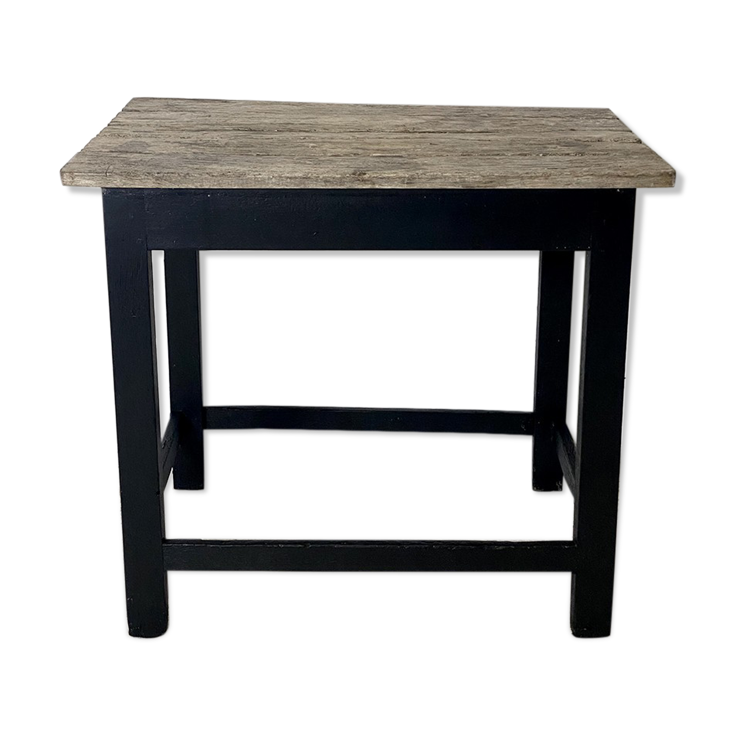 Old blackened wood work table and varnished top