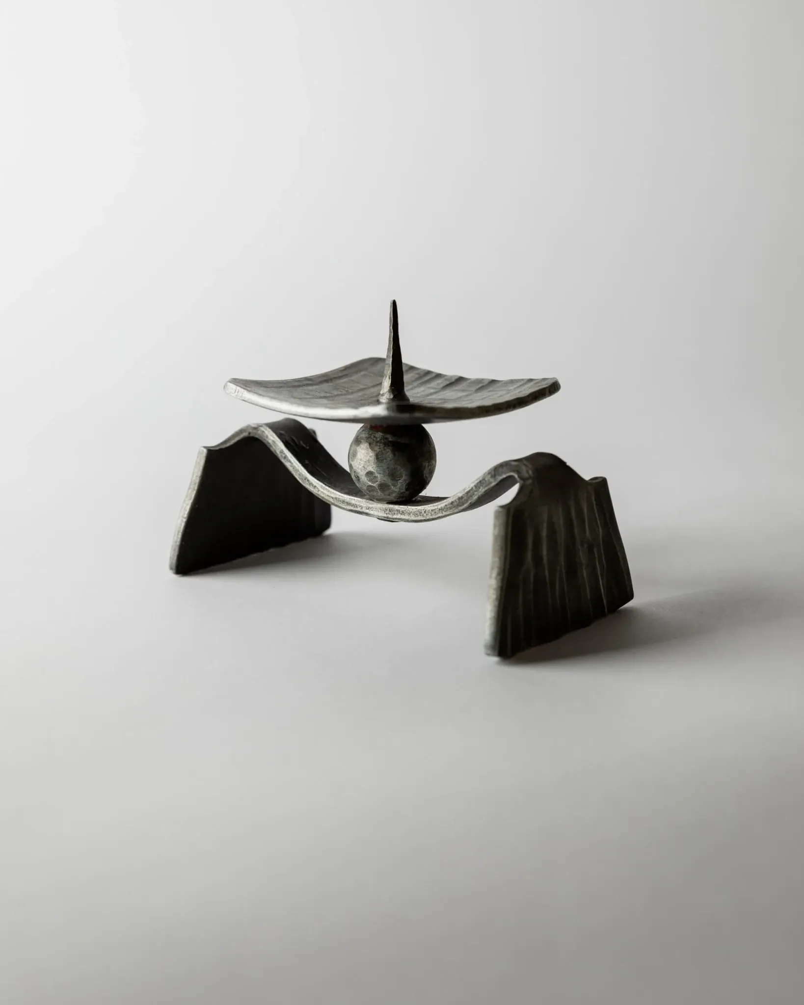 Vintage brutalist iron candlestick from the 1970s.