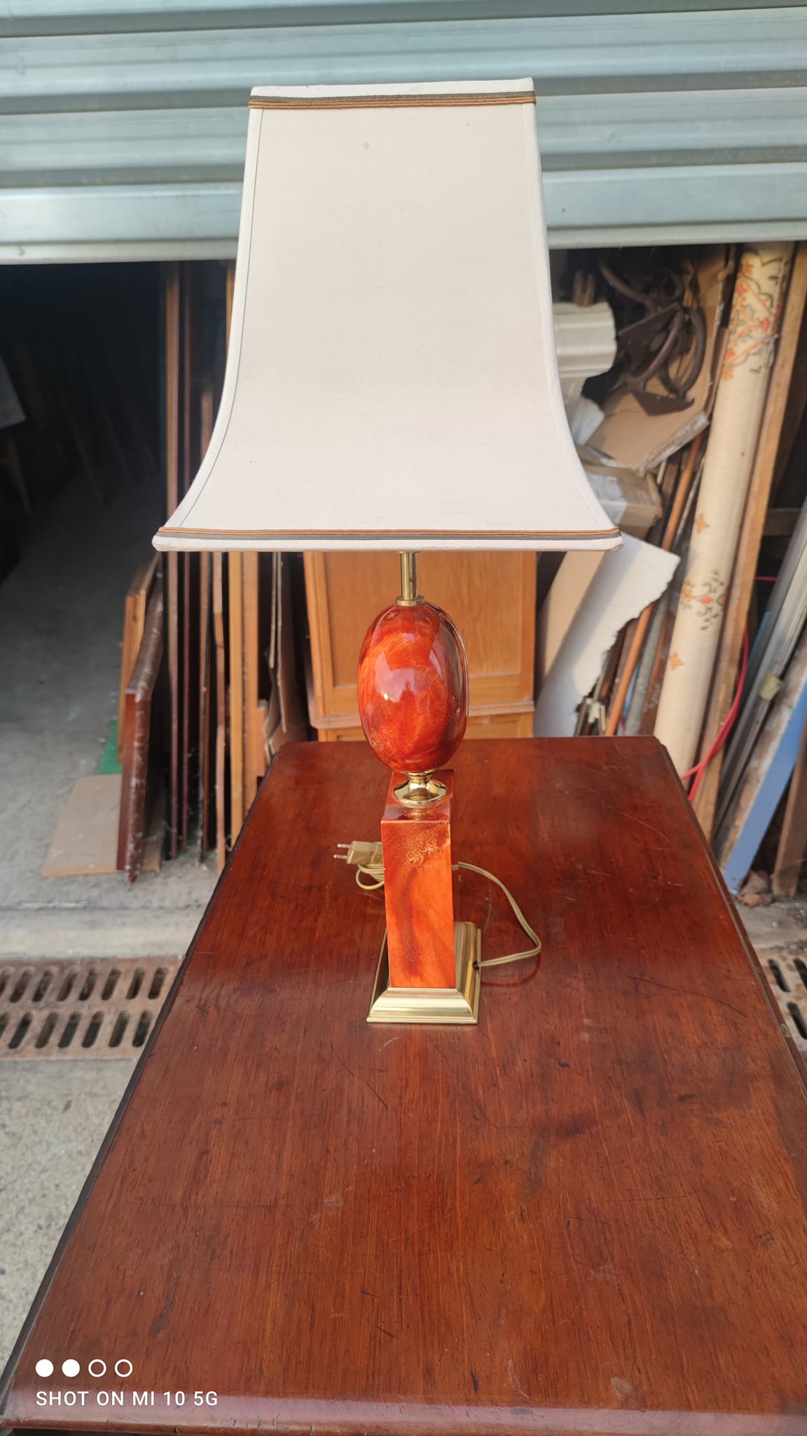 Lamp circa 1970 in iron and lacquered wood as well as bronze