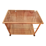 Trolley on wheels in gilded brass and beveled glass
