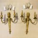 Louis XVI bronze wall sconces from the 19th century with quiver decorations.