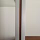 Large Scandinavian wall-mounted wood and aluminum bookcase circa 1960