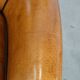 Cognac-colored sheep leather armchair finished with decorative nails