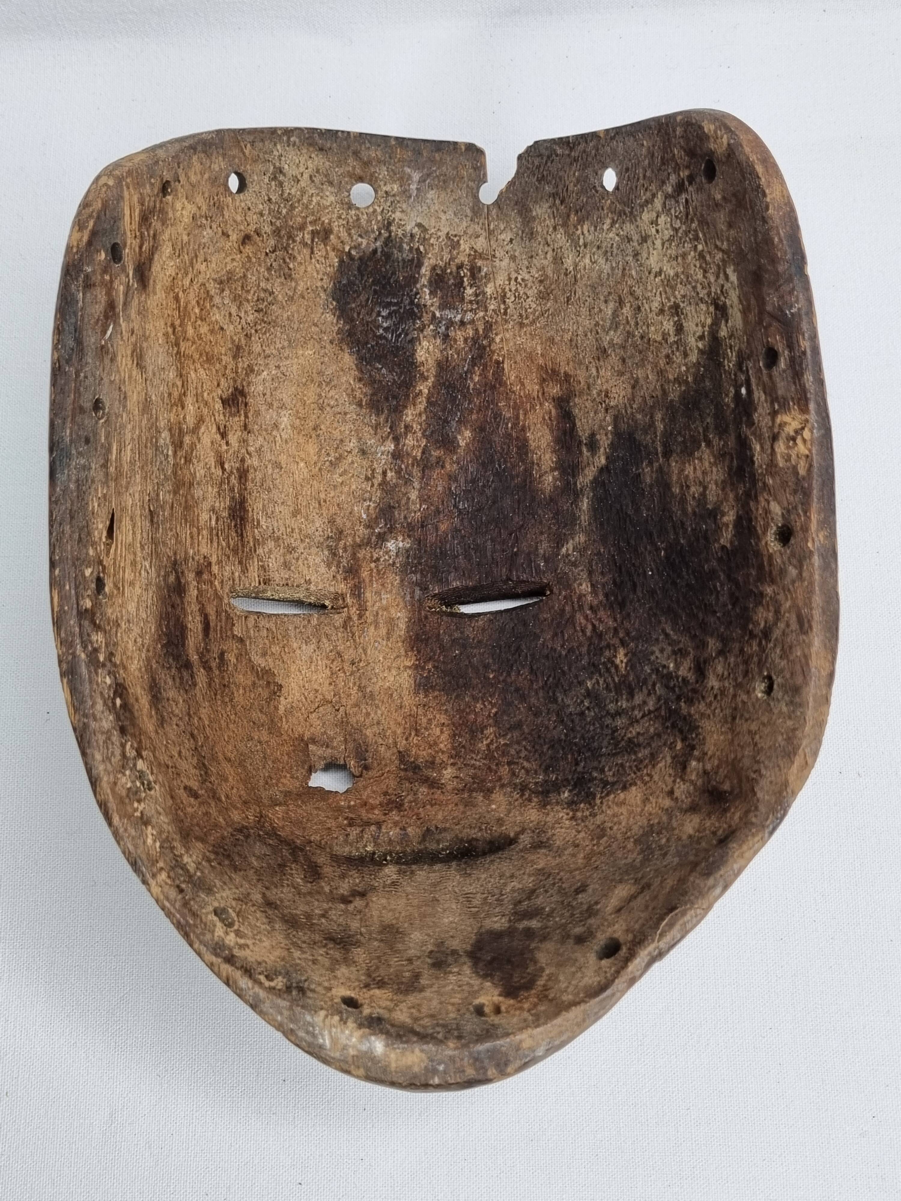 Antique carved wooden tribal mask, early-mid 20th century