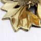 Brass floral candle holder