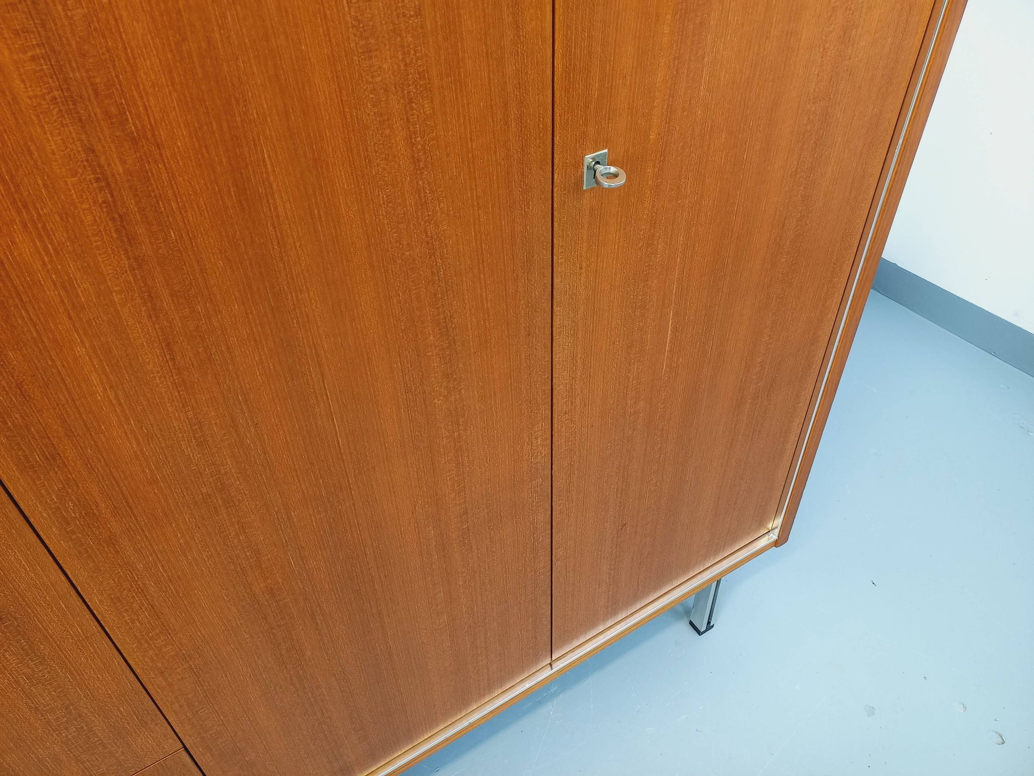 Vintage Scandinavian modernist wardrobe in teak and metal from the 1960s.