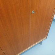 Vintage Scandinavian modernist wardrobe in teak and metal from the 1960s.