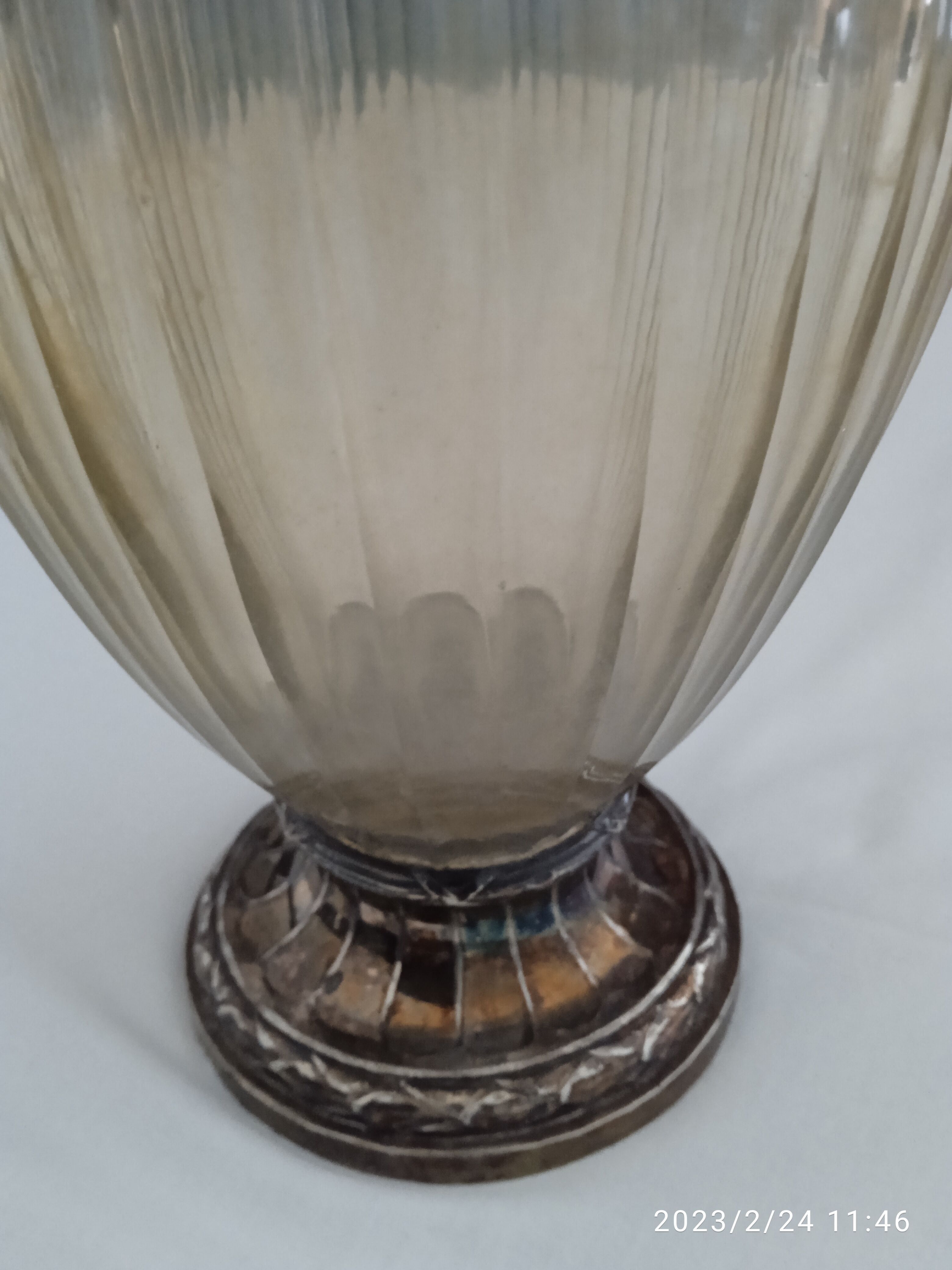 Glass and silver metal ewer