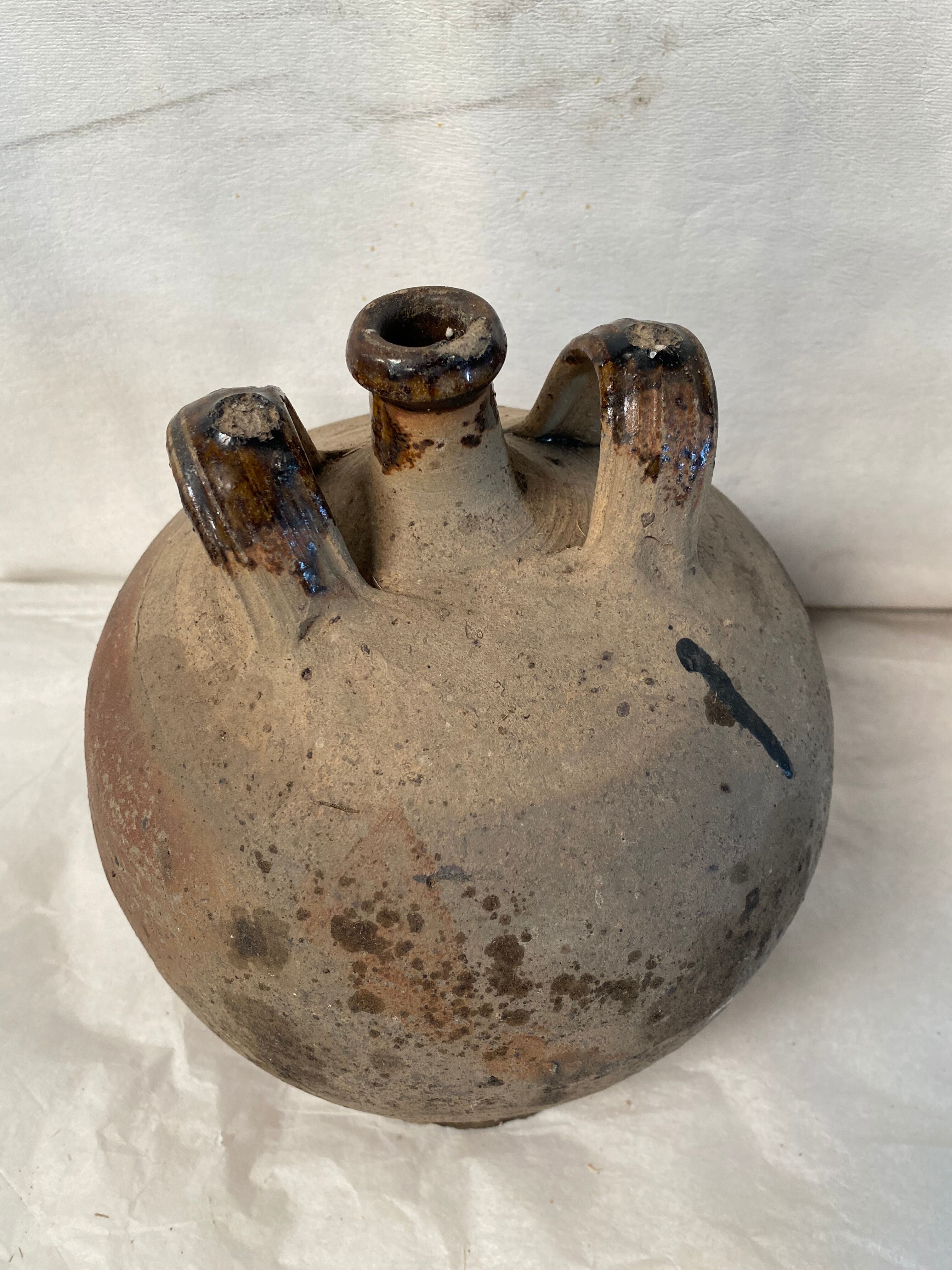Vase jug in ancient sandstone