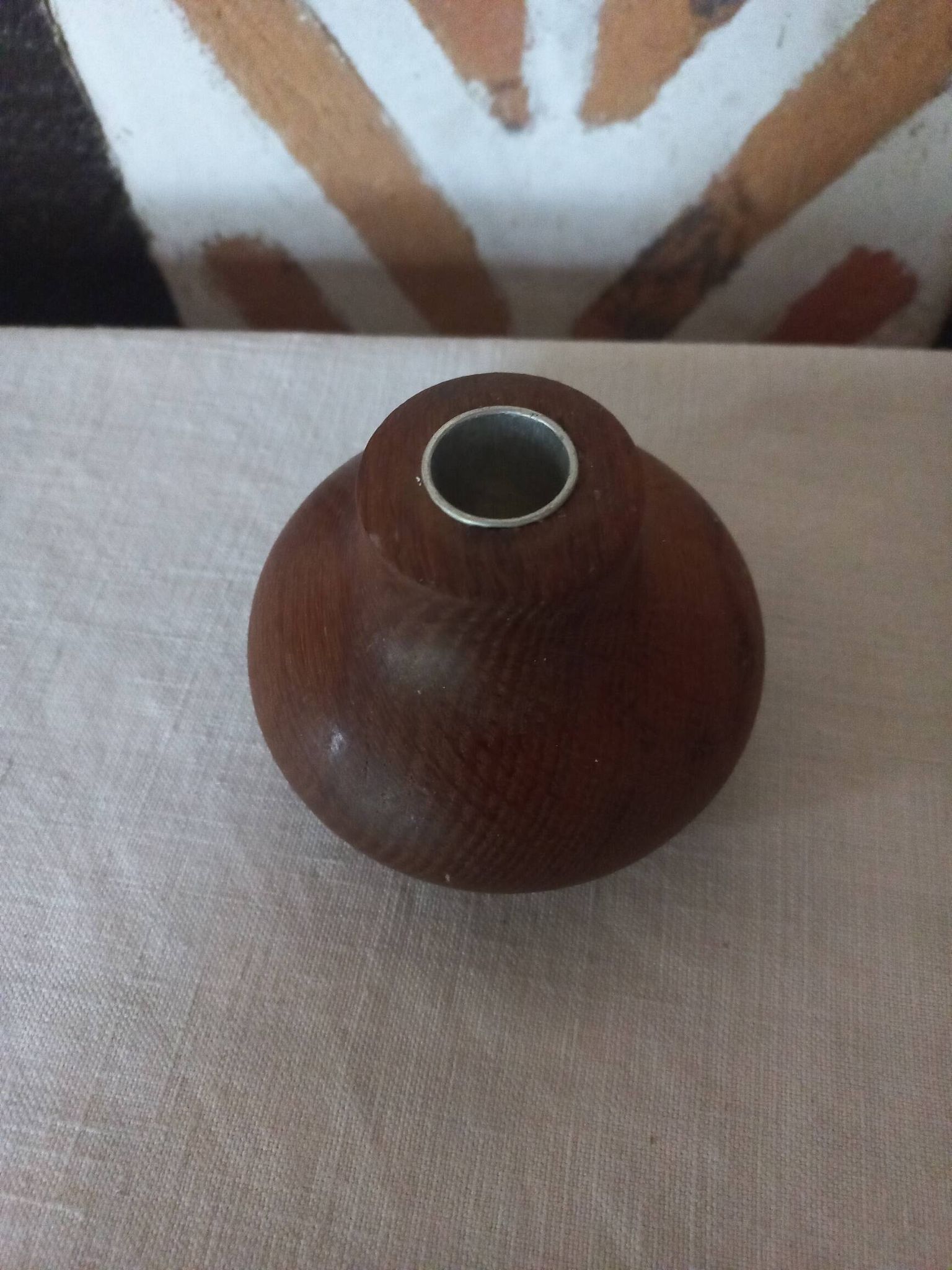 Ball shaped wooden candle holder