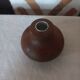 Ball shaped wooden candle holder
