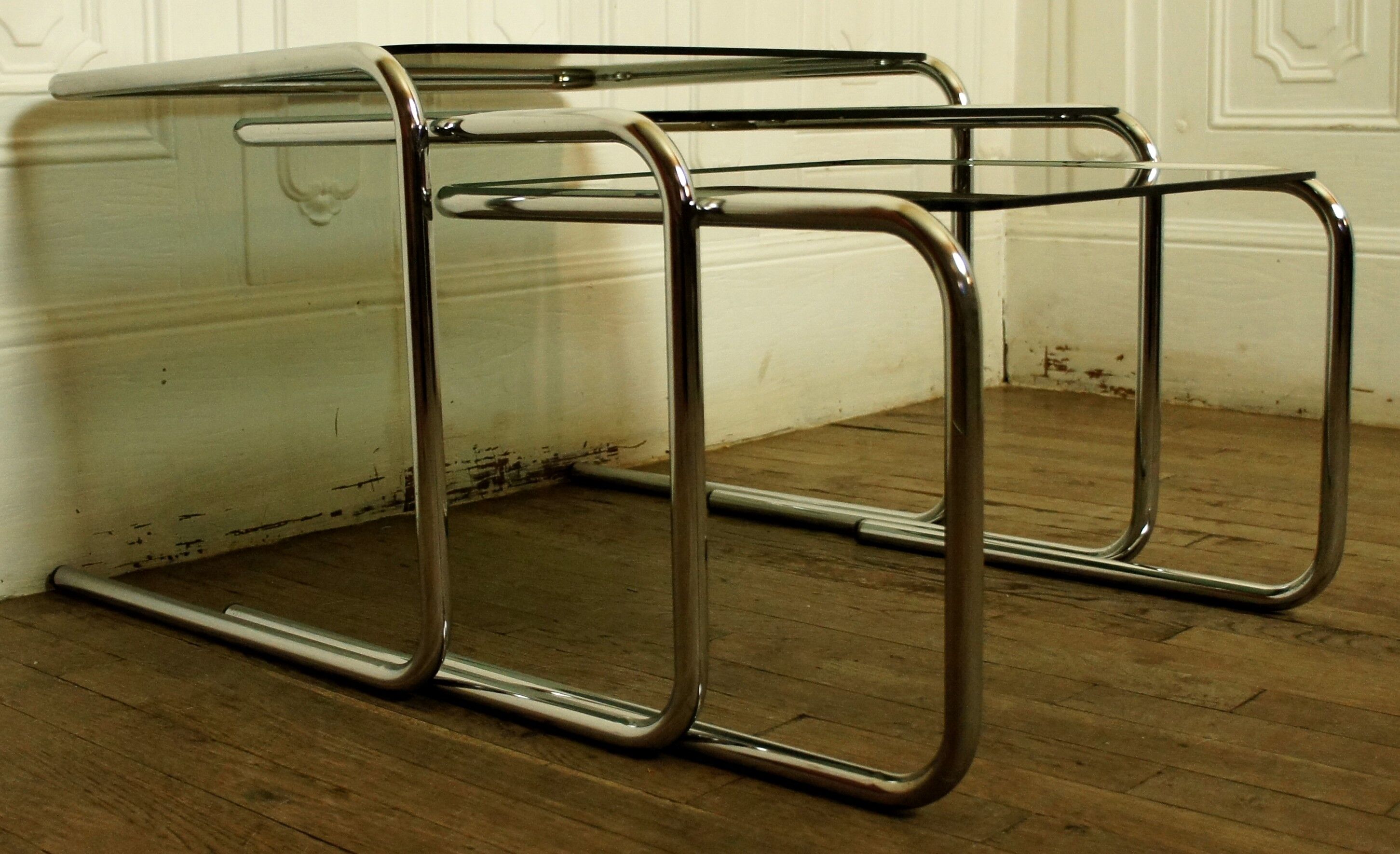 Tables in chrome metal and smoked glass 1970