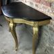 Louis XV style console in carved wood with waxed black wood top