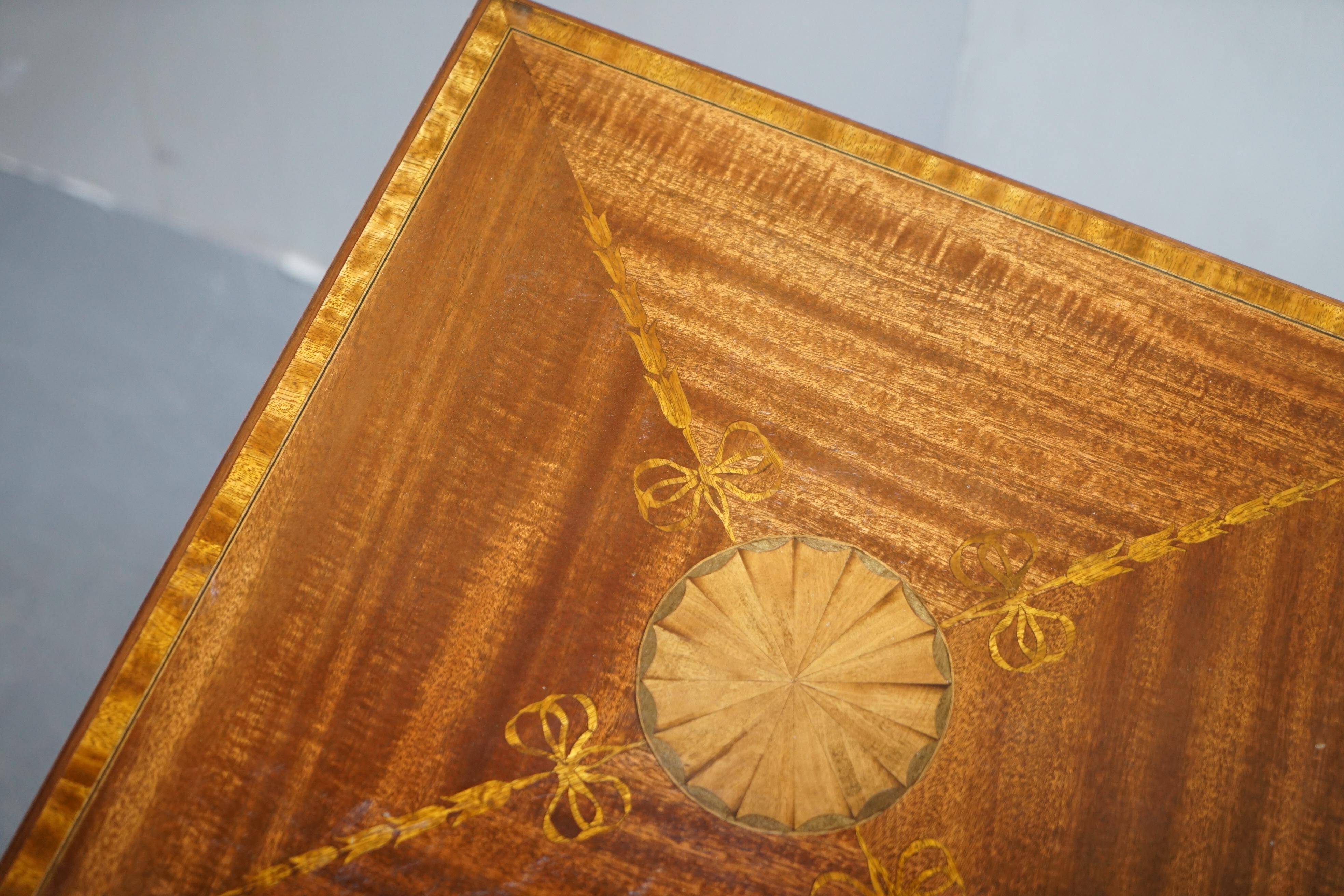 Edwardian burr walnut revolving bookcase with Sheraton inlays circa 1900