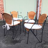 4 vintage wrought iron rattan chairs.