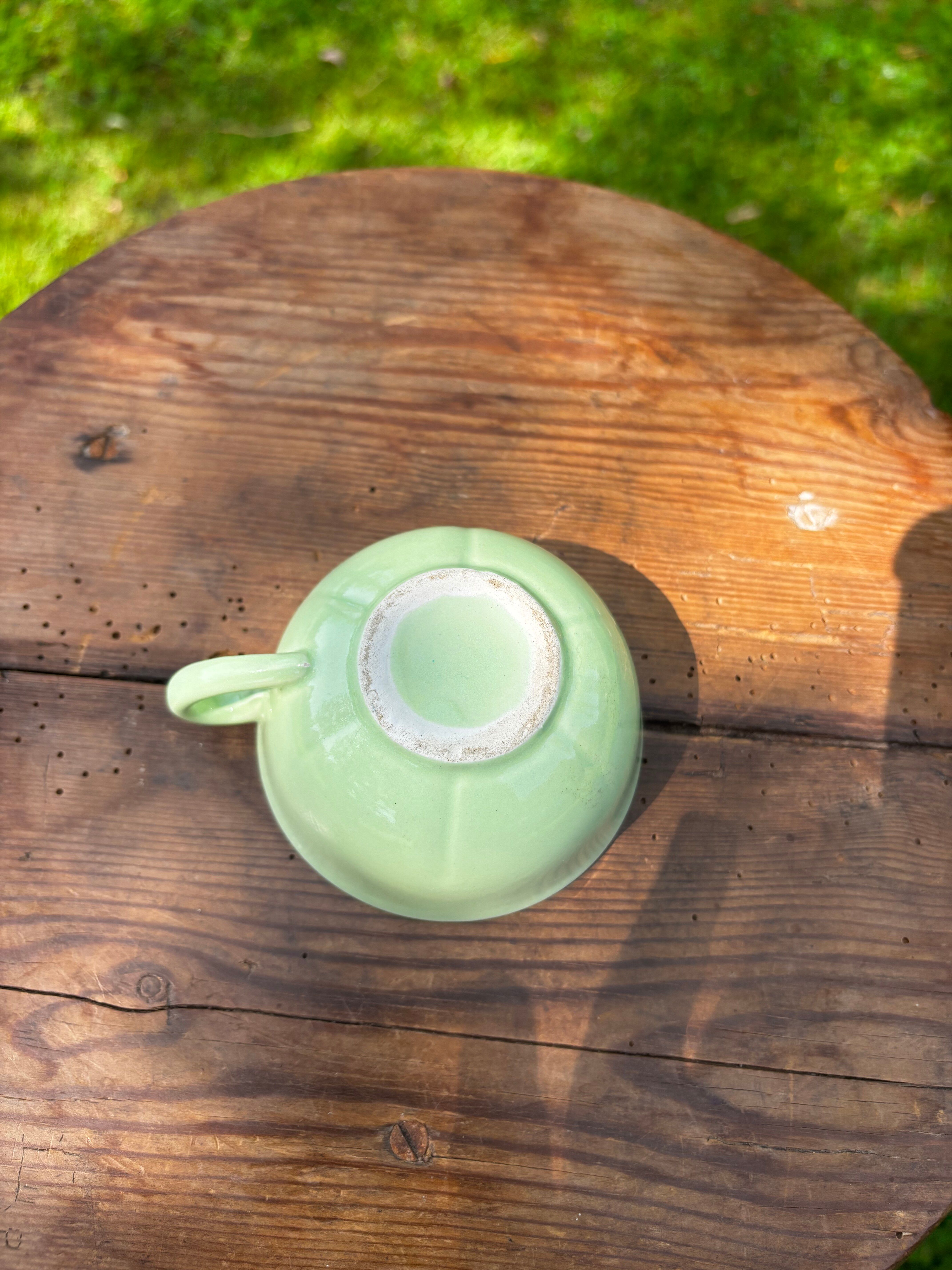 Set of 5 mismatched vintage pastel-coloured cups.