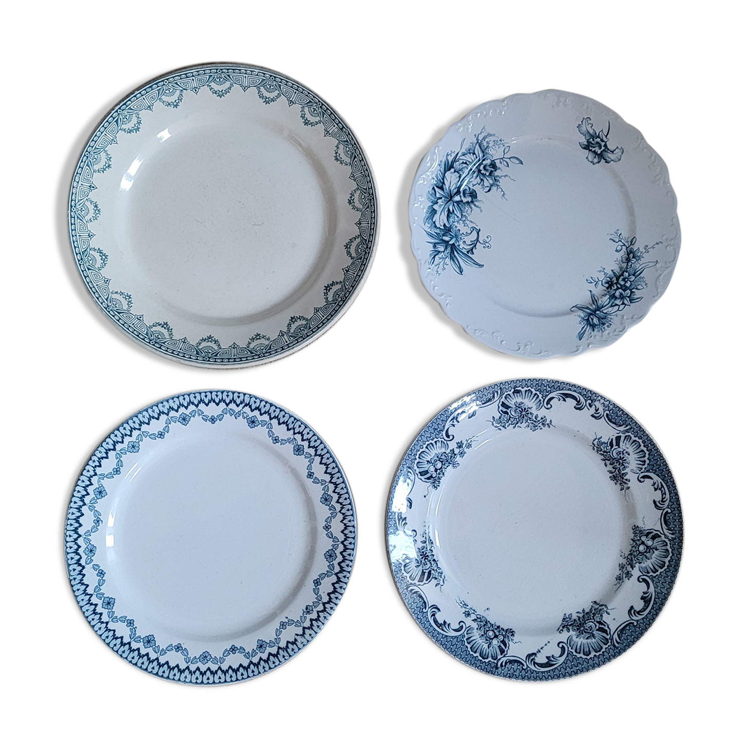 Quartet of mismatched blue plates