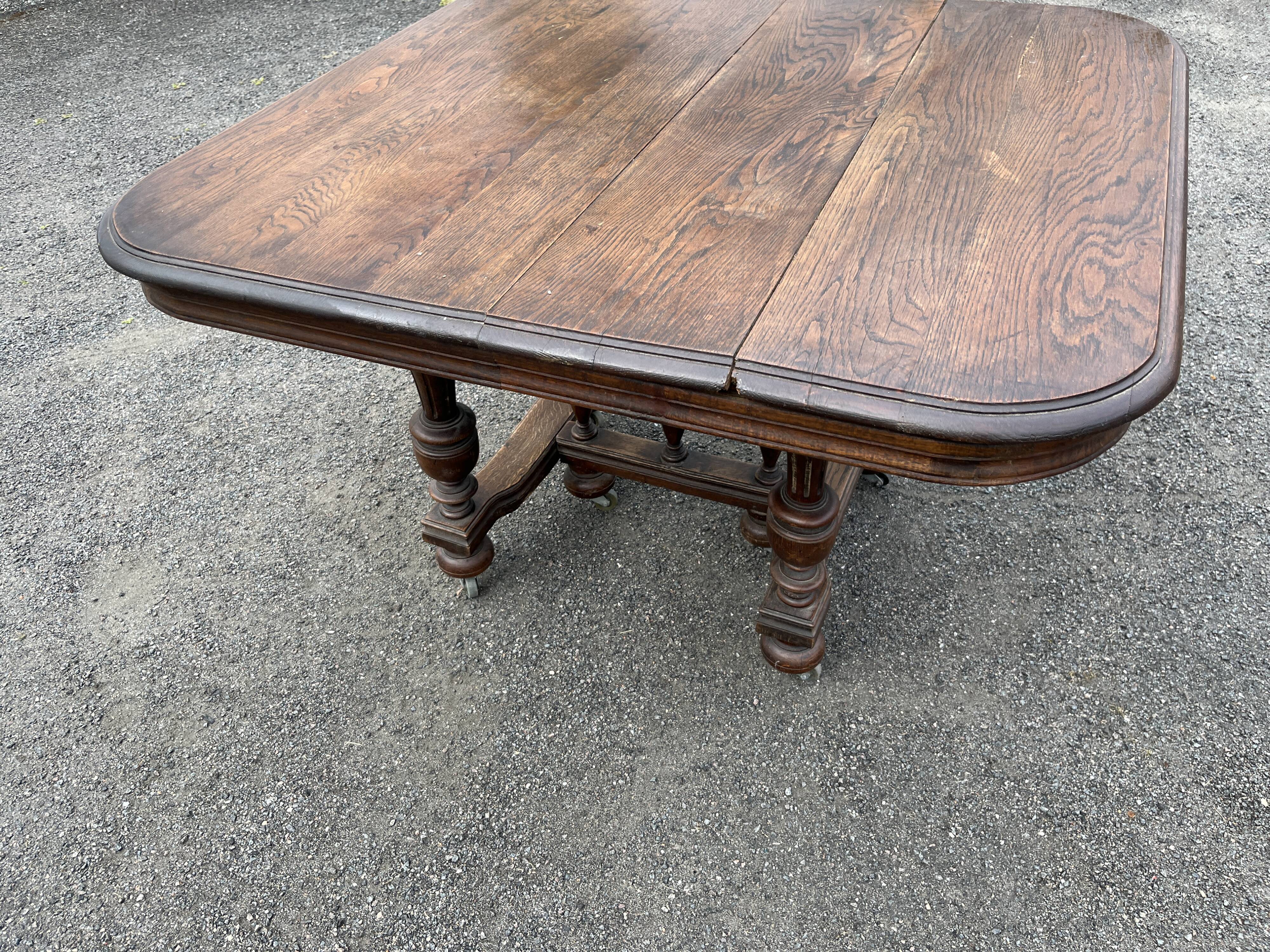 Henry II style oak dining table