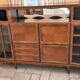 Wooden sideboard with 5 doors and 3 drawers, 2 glass doors.