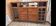 Wooden sideboard with 5 doors and 3 drawers, 2 glass doors.