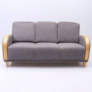 Three-seater Art Deco style sofa in grey fabric and curved wood.