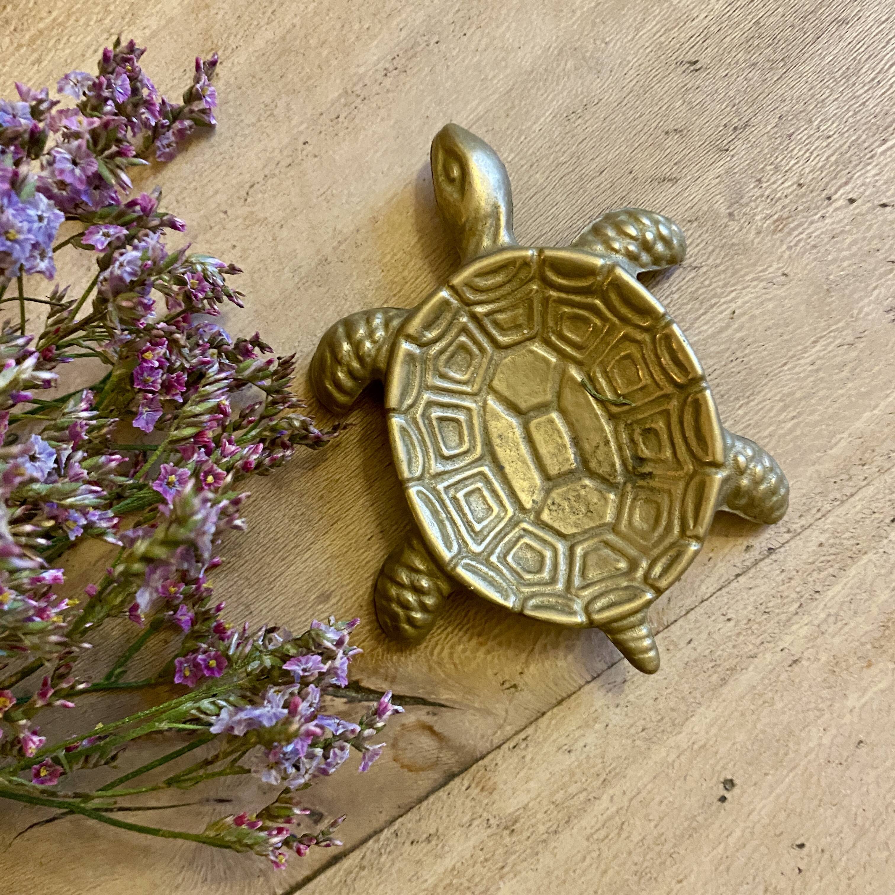 Vintage brass turtle pocket emptier