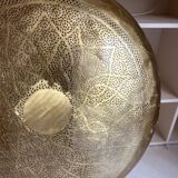 Large oriental wall lamp in hammered gold-plated perforated brass, 100 cm.
