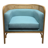 Fauteuil Kokoe en teck et cannage avec coussin bleu