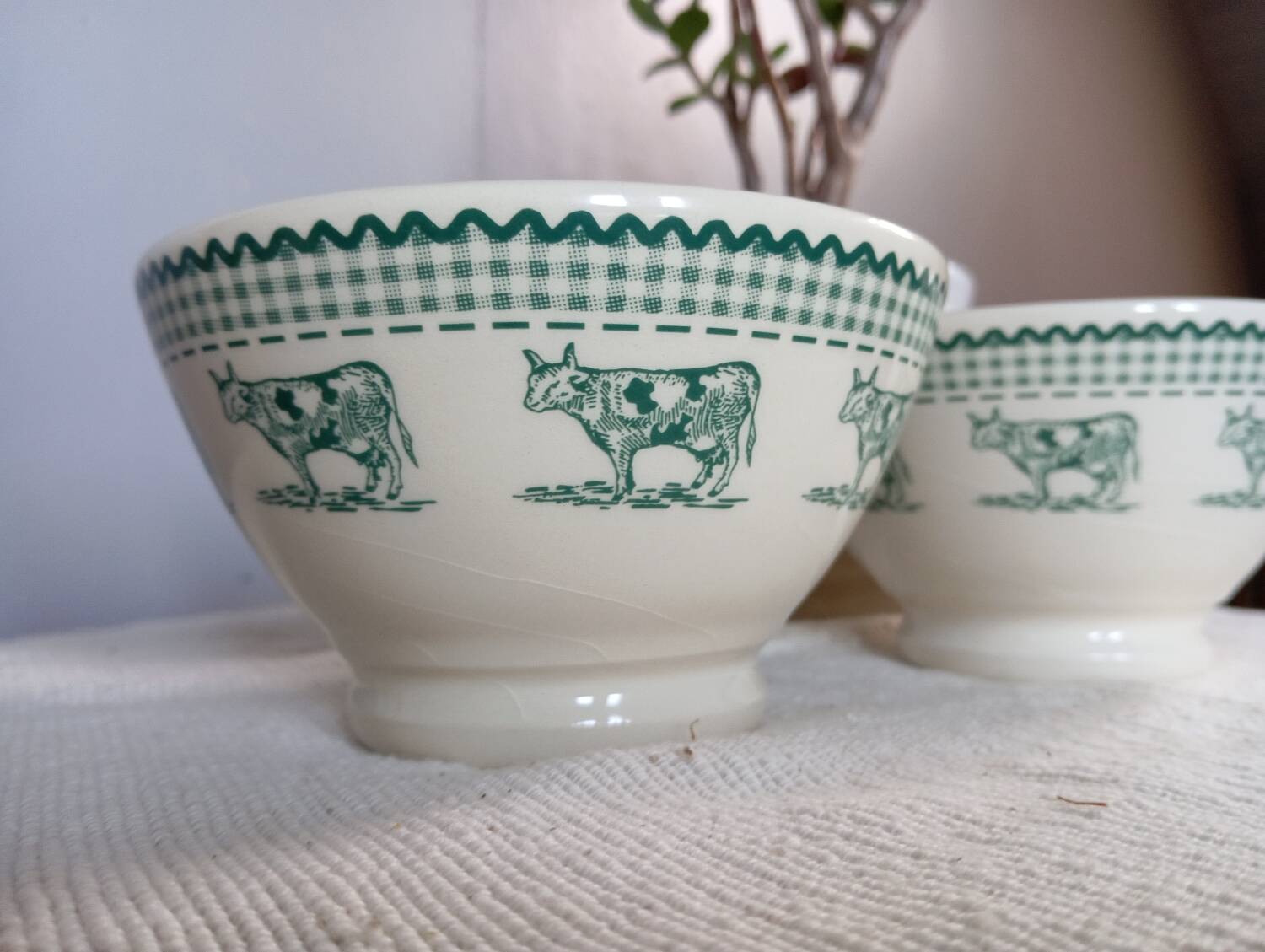 Duo of “daisy” cow decor bowls by Geneviève Lethu, 1996