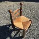 Straw low chair in the style of Charles Dudouyt