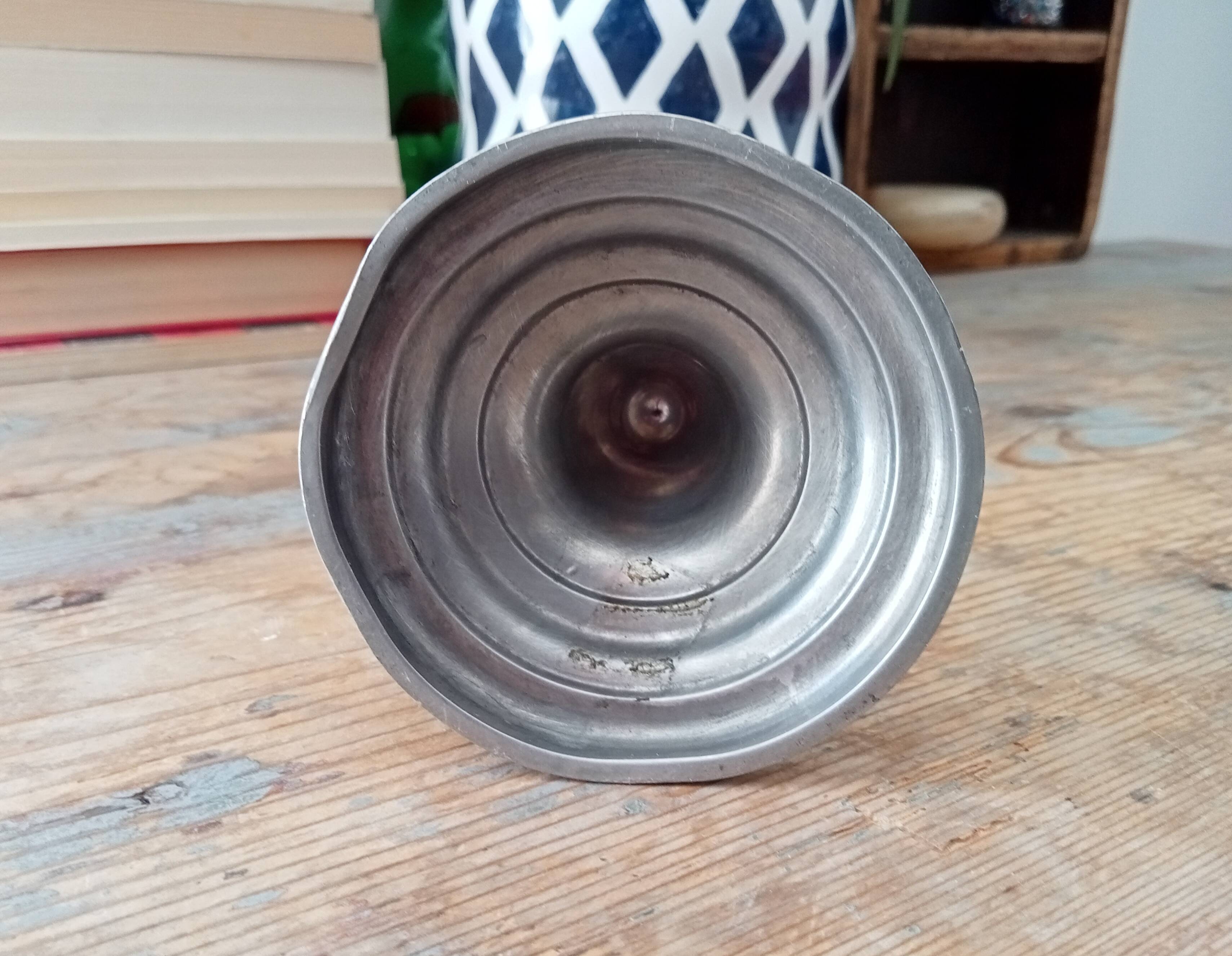 Antique candle holder in pewter and brass