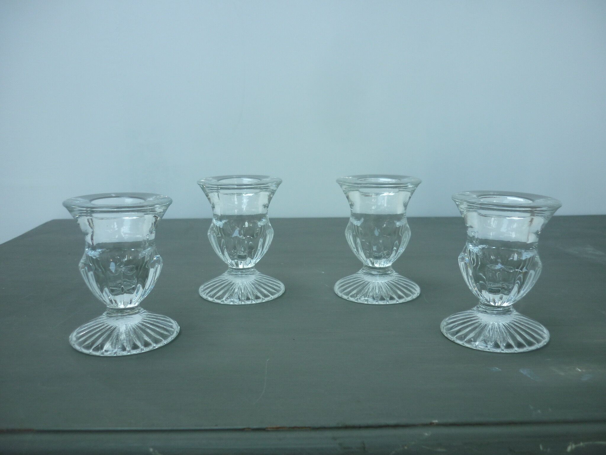 4 molded glass candle holders