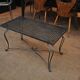 Table basse metal perforé pied fer forgé 1940