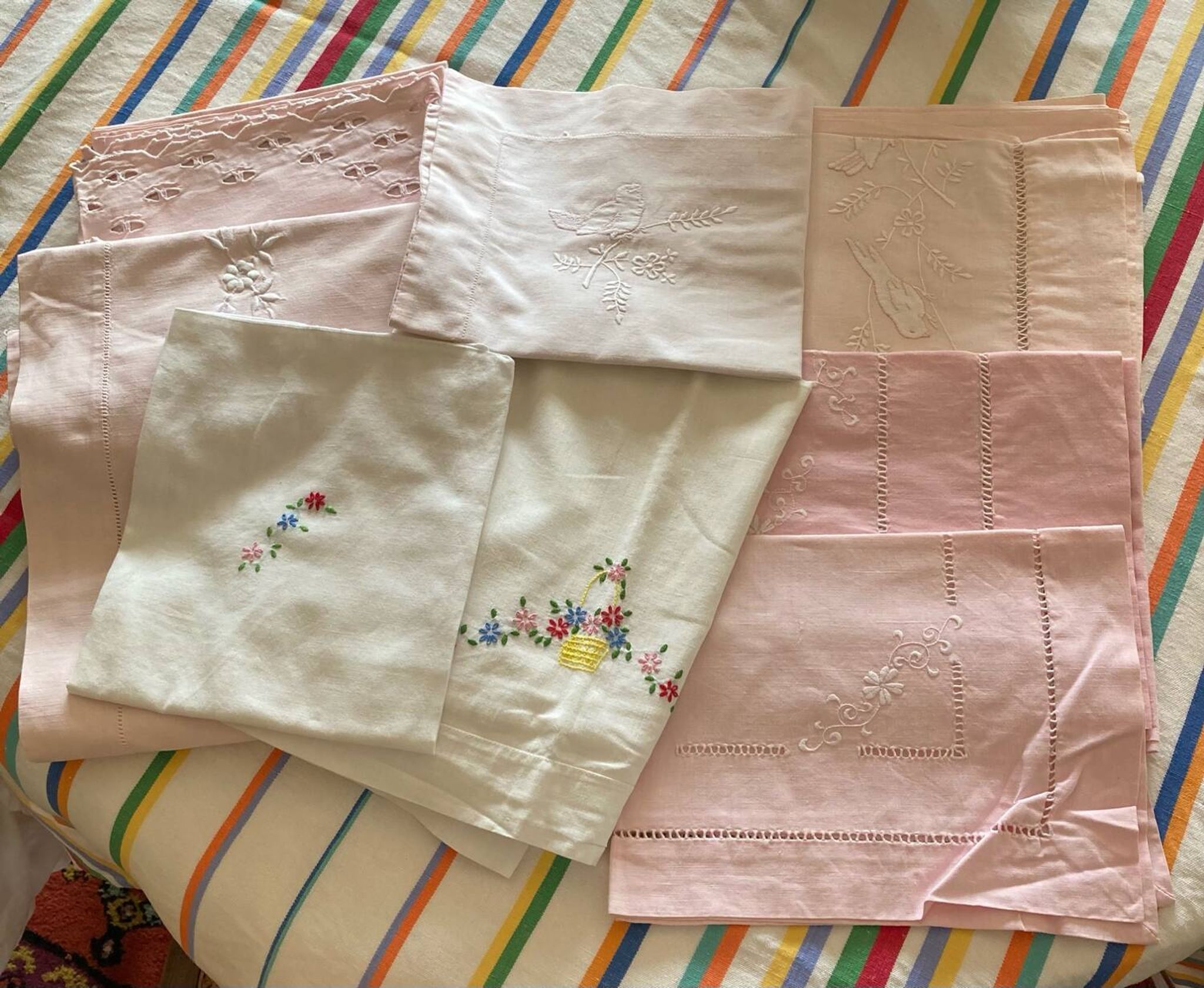 Set of embroidered baby bed sheets