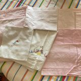 Set of embroidered baby bed sheets