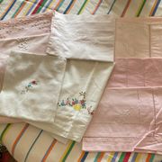 Set of embroidered baby bed sheets