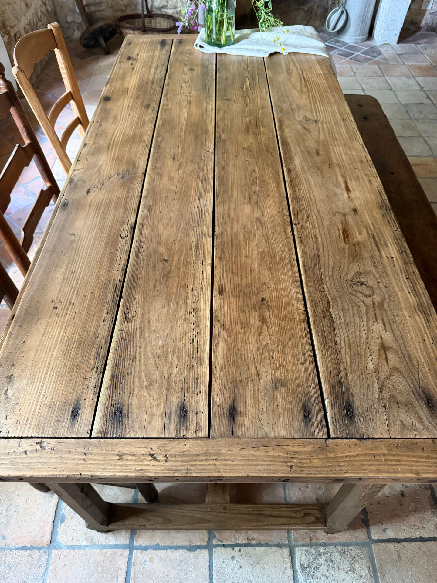 Renovated raw wood farmhouse table