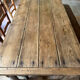 Renovated raw wood farmhouse table