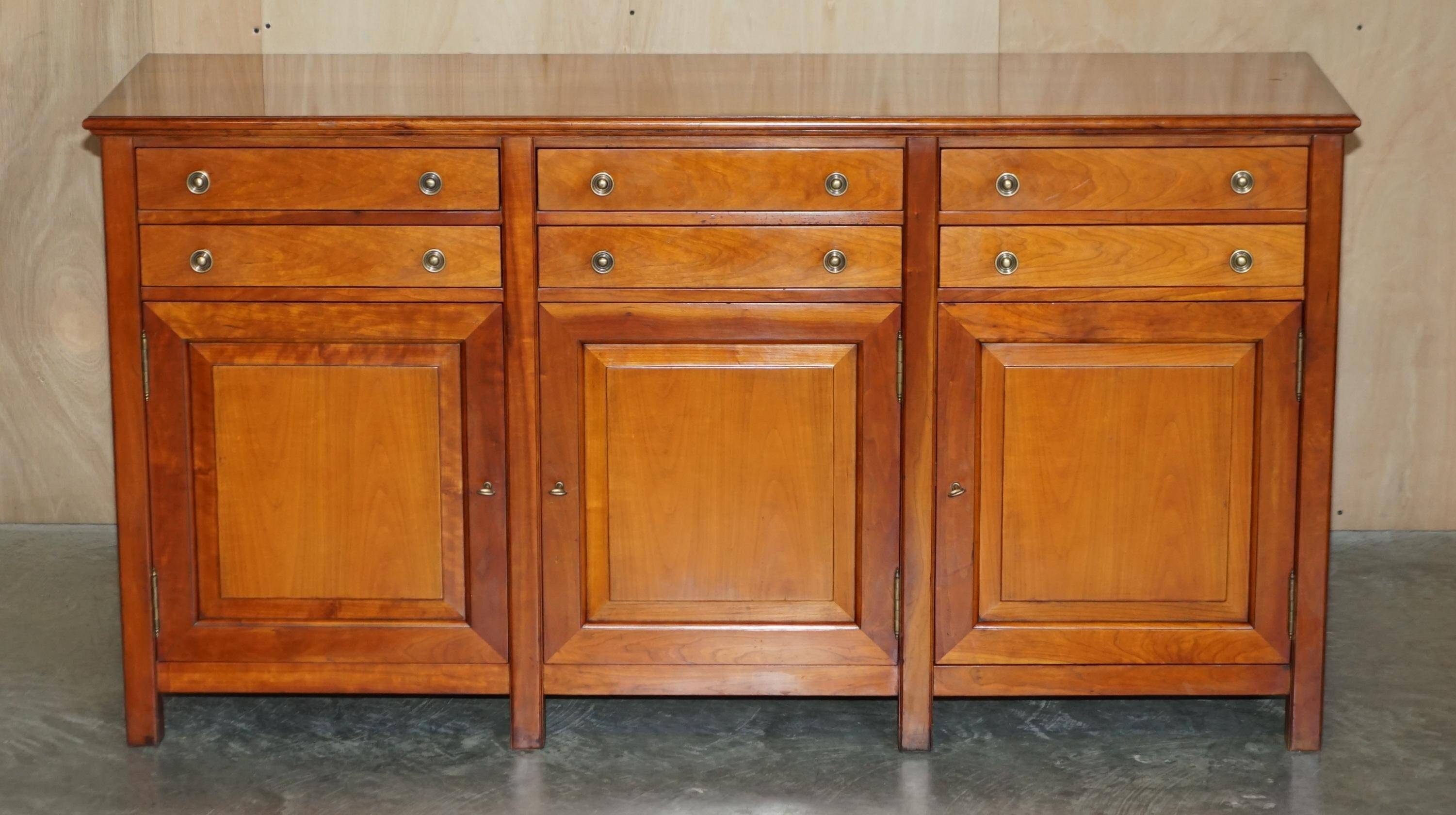 Large buffet Multiyork in solid cherry wood with six drawers.