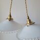 Pair of serrated opaline suspensions