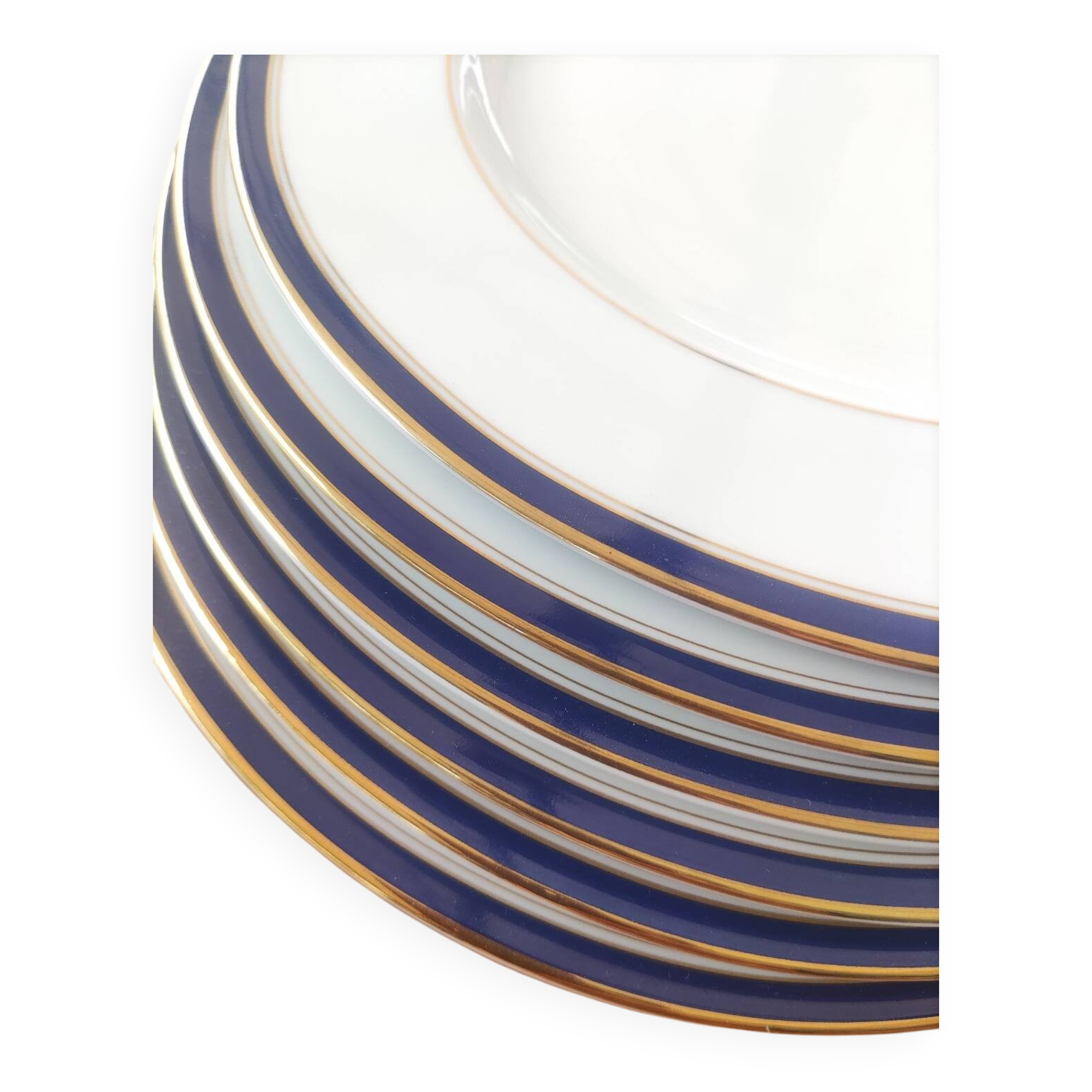 Six blue and gold Limoges porcelain dinner plates