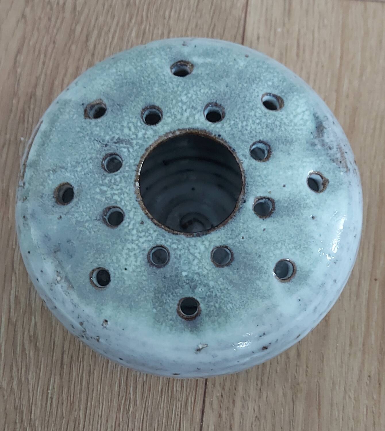 Signed ceramic flower pick