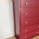 Chest of drawers with 5 drawers in black cherry.